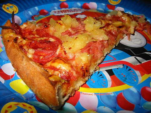 A slice of hawaiian pizza