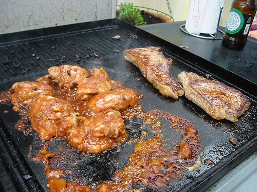 Chicken making a mess on the barbecue