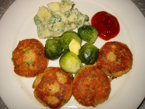 Salmon fishcakes, brussels sprouts, potato salad and ketchup
