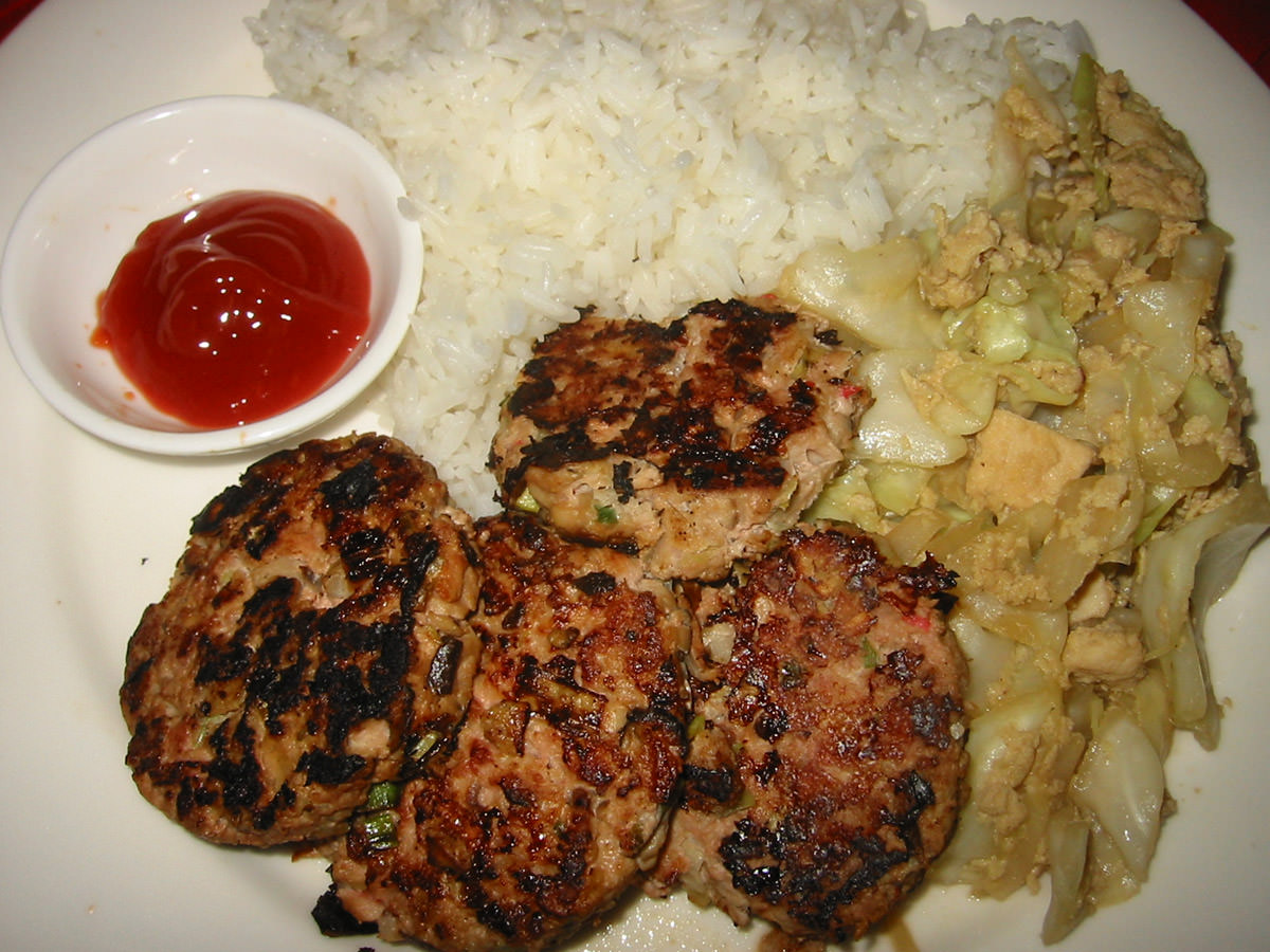 Pork patties, fried cabbage and egg with rice