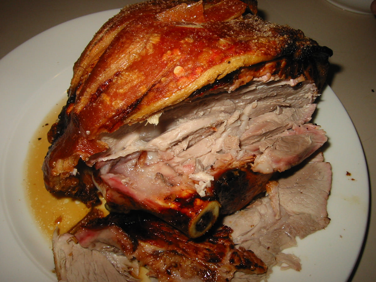 Partially carved roast pork