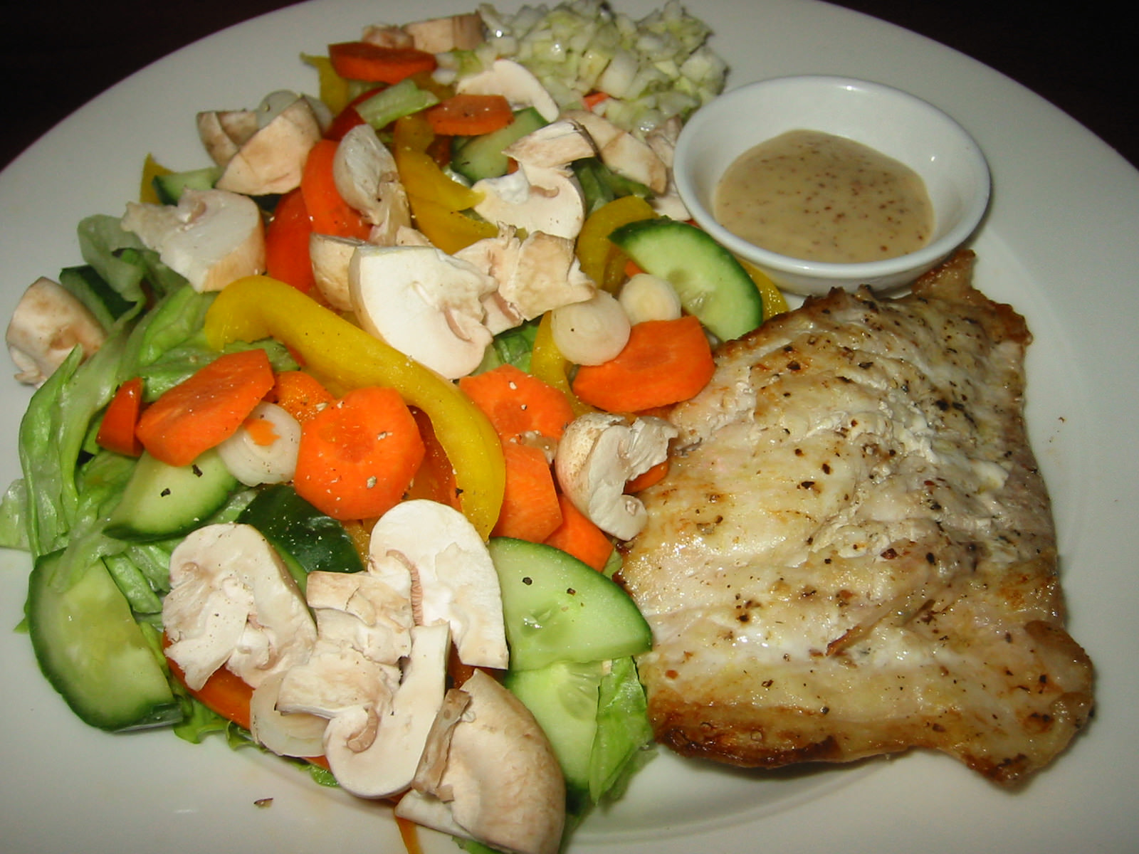 Grilled fish and salad