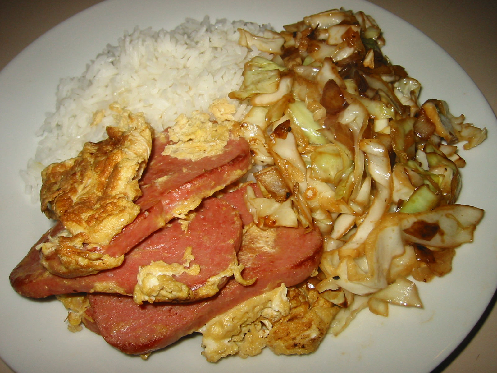 Fried SPAM and egg, cabbage and rice