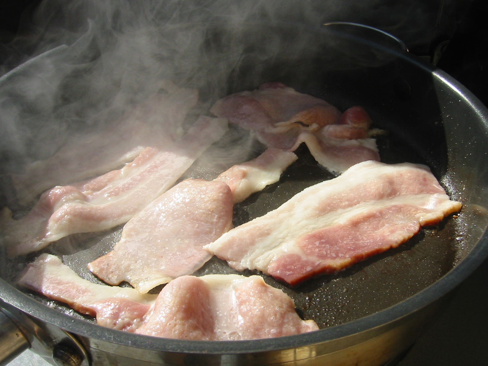 Frying bacon (with smoke)