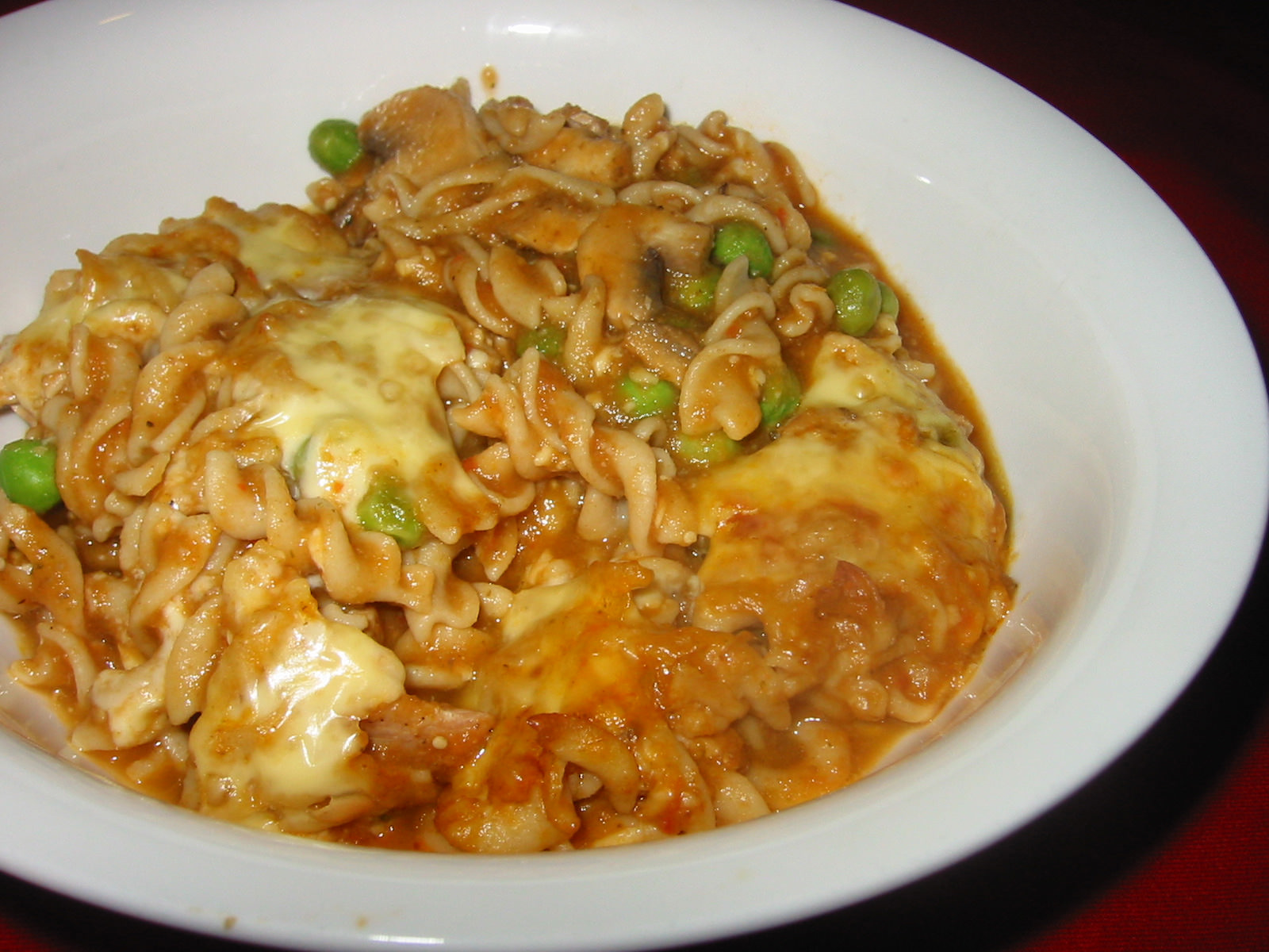 Pasta bake with chicken, mushrooms, peas and (ugh) soya cheese