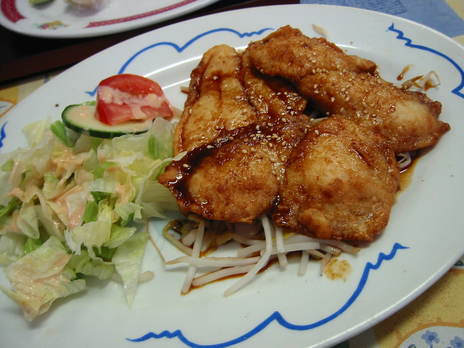 Teriyaki fish with salad