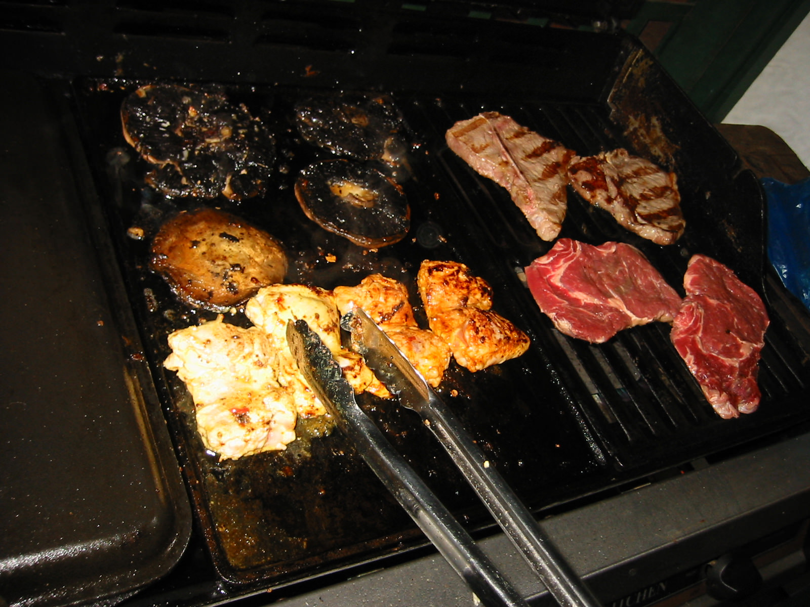 Mushrooms, chicken and steak on the barbie