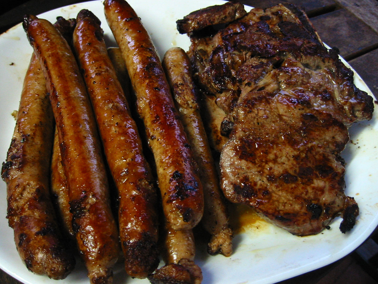 Platter of steaks and snags