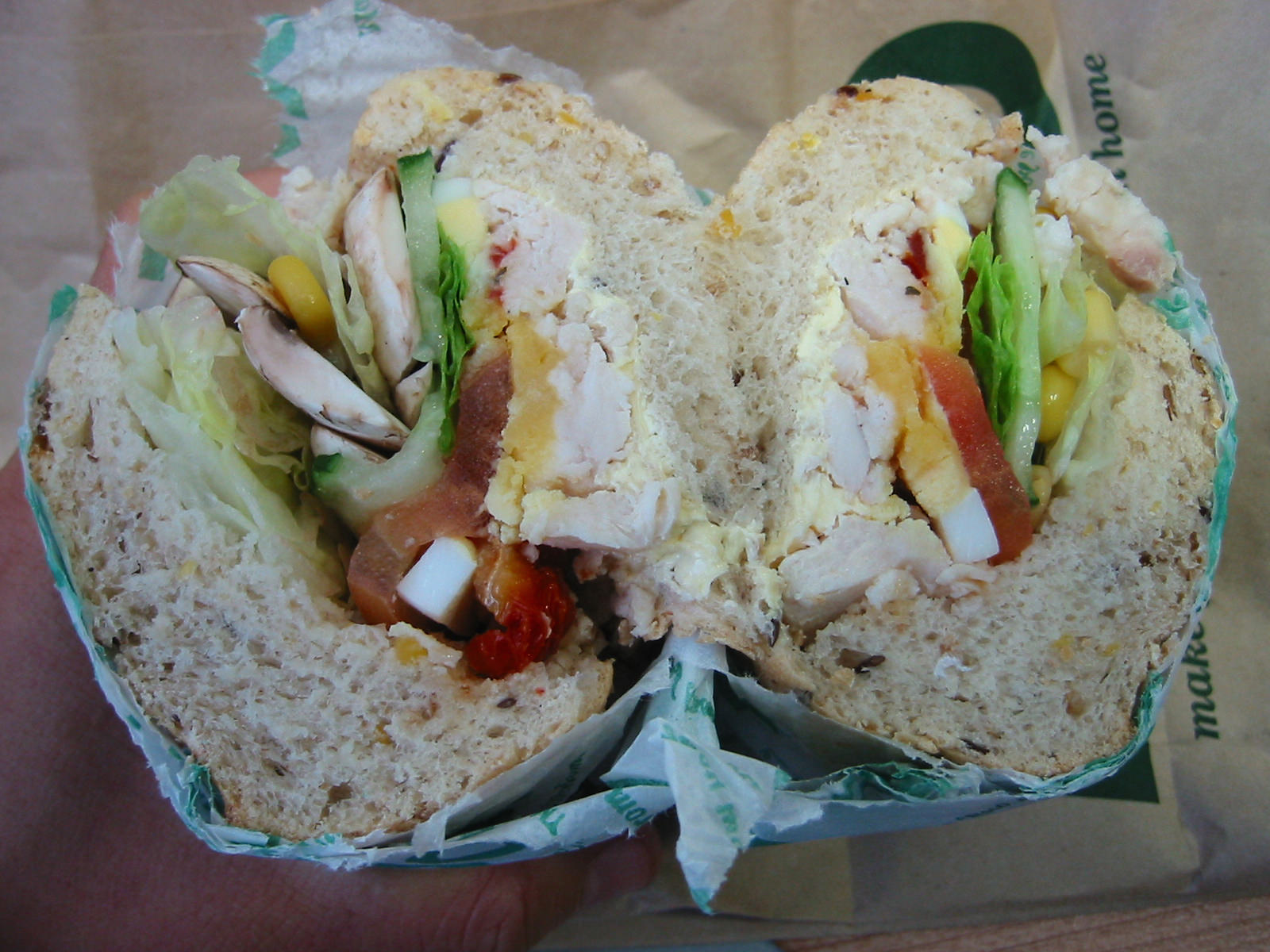 Multigrain roll with chicken, egg and salad