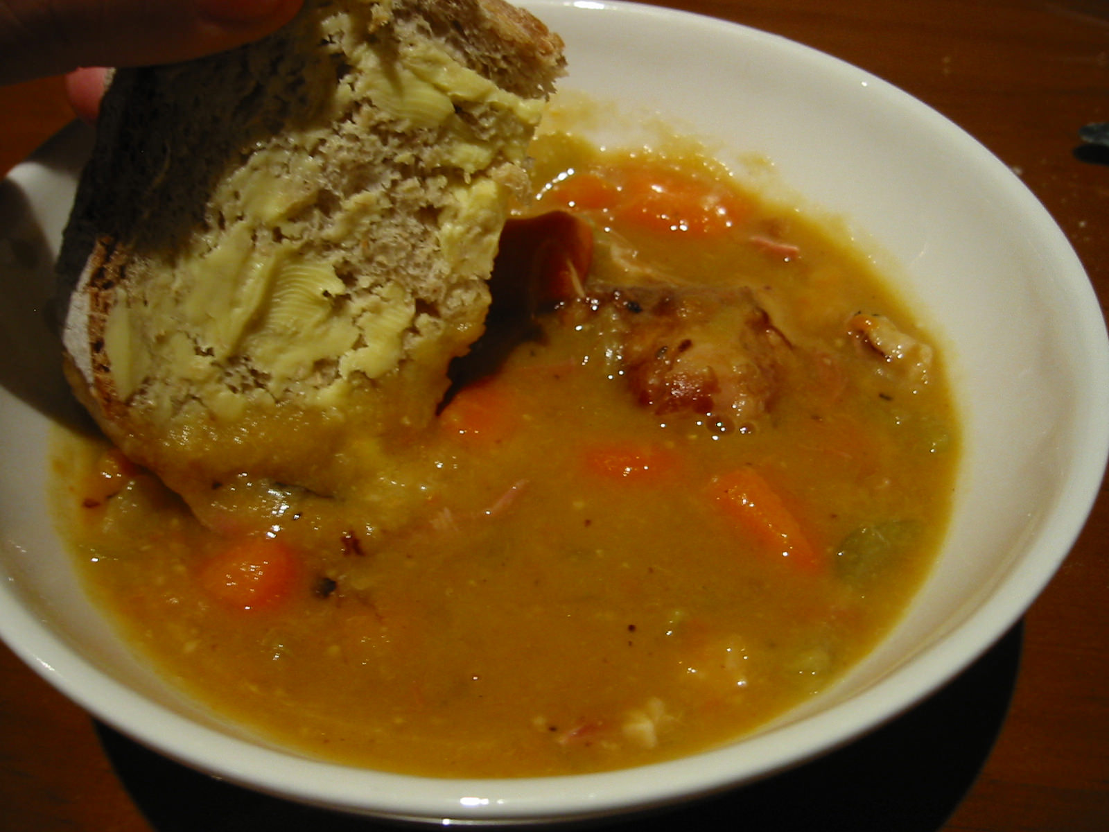 Pea and ham soup, bread dunking