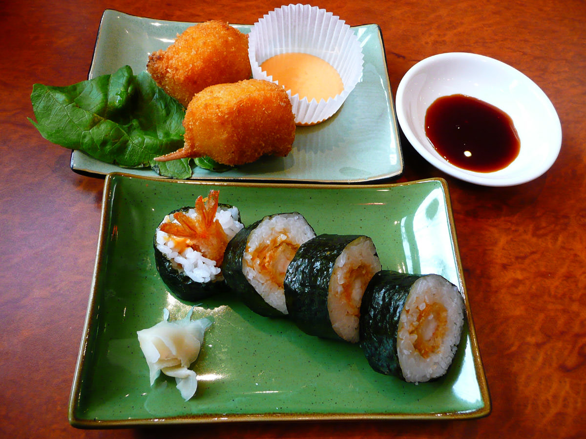Crumbed prawn sushi and crab claws