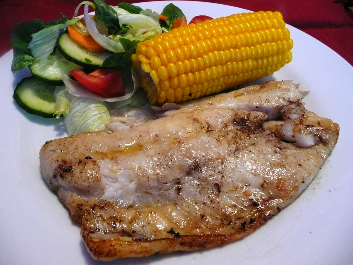 Grilled Nile perch, corn and salad