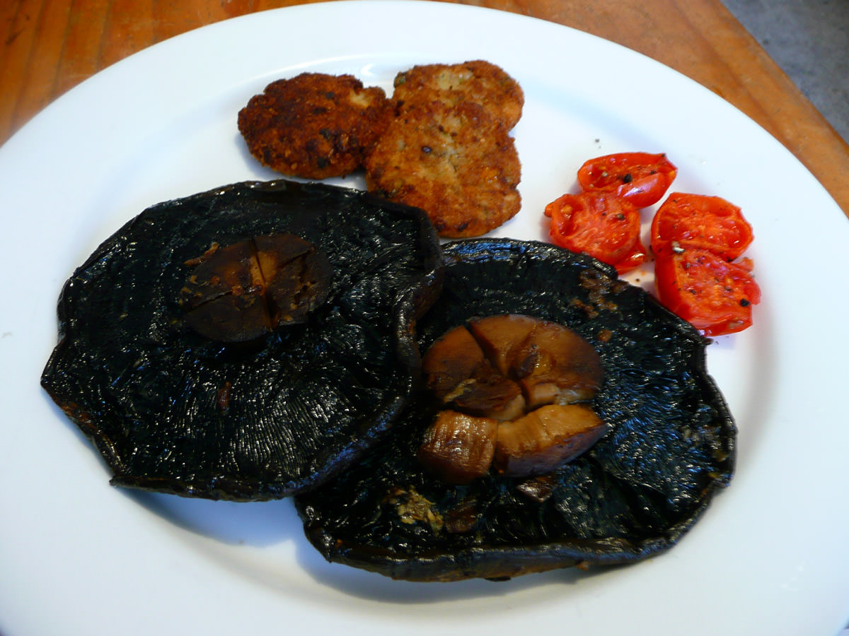Grilled garlic portobello mushrooms, grilled cherry tomatoes and fish cakes