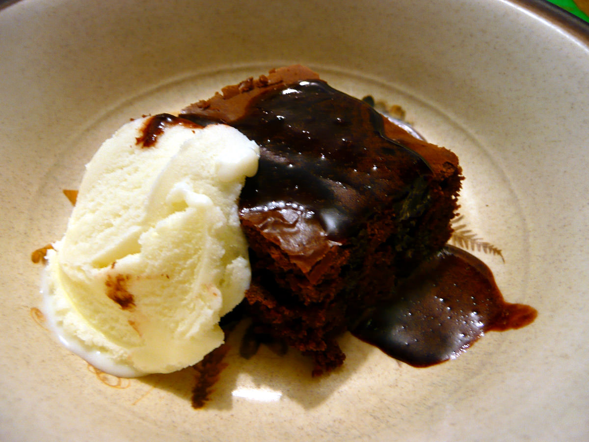 Chocolate brownie, chocolate sauce and vanilla ice cream