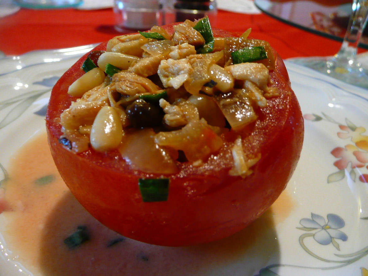 Chicken and pinenut stuffed tomato