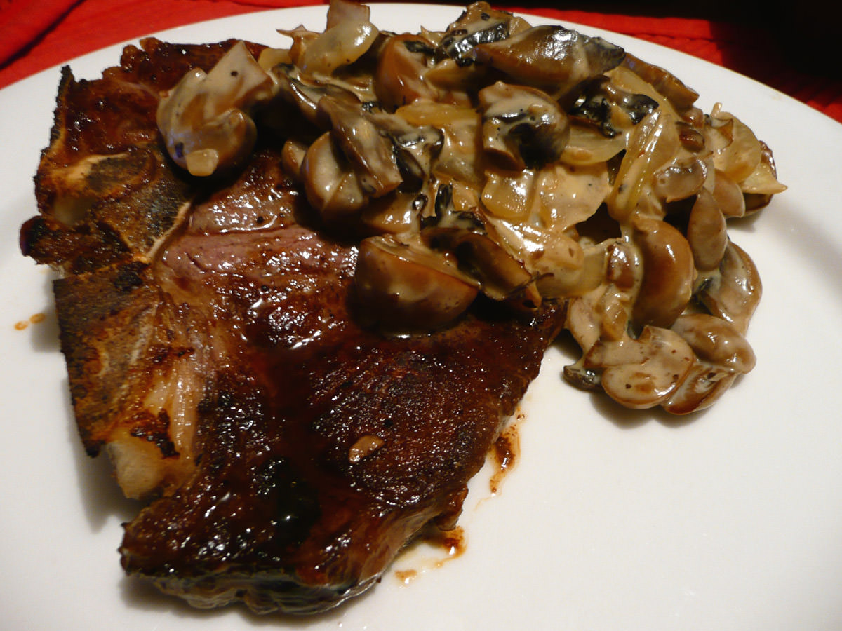 T-bone steak with creamy mushroom sauce - another angle