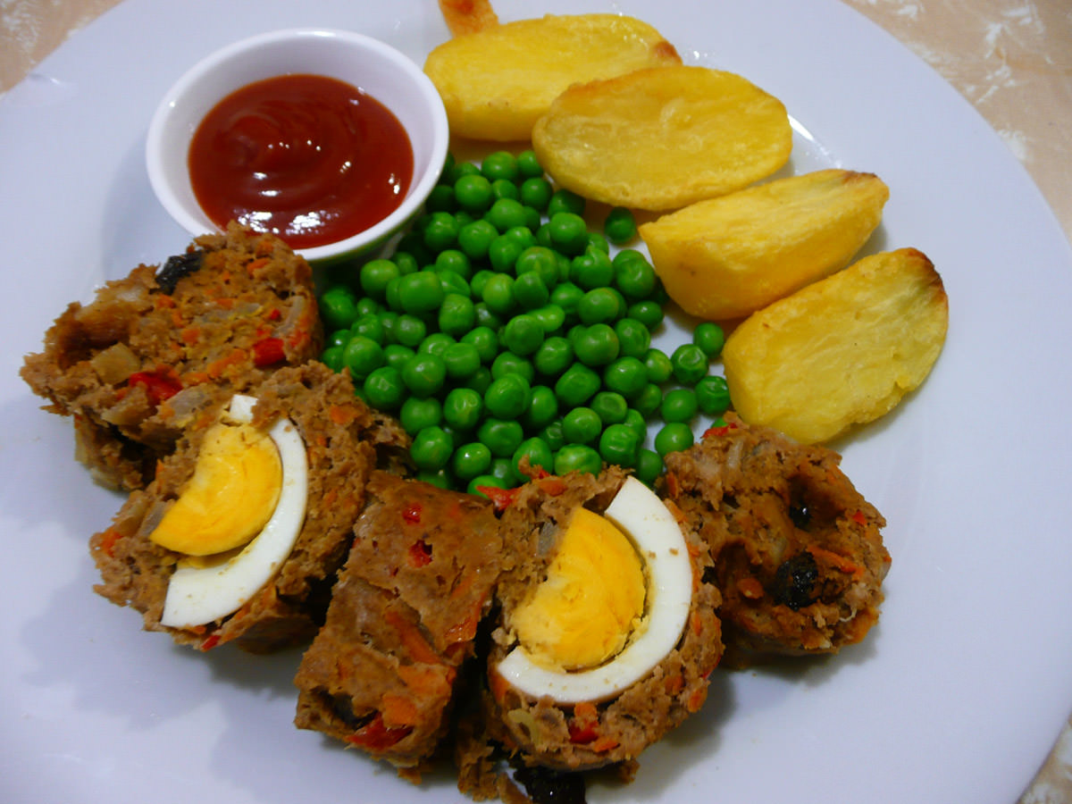Filipino-style meatloaf, roasted potatoes, peas and ketchup