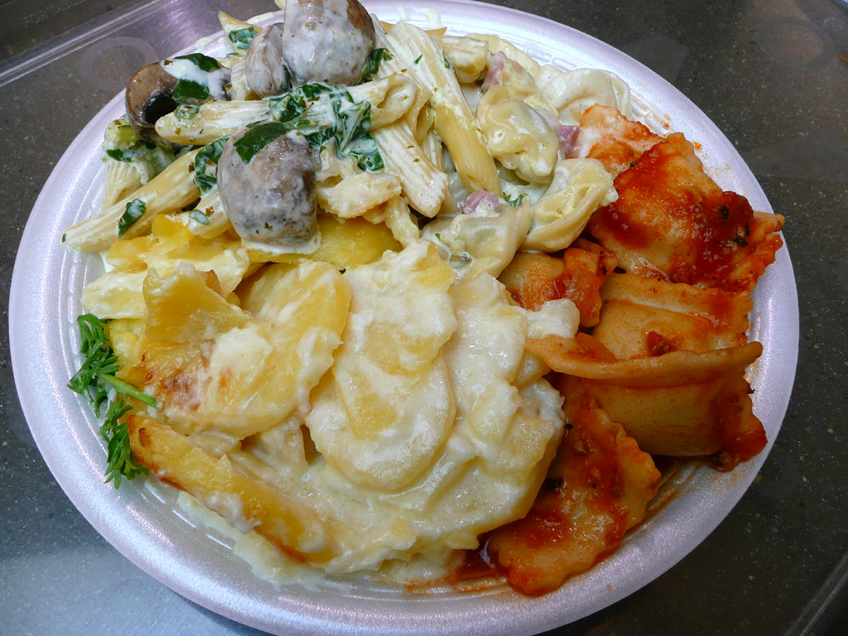 Potato bake, mushroom and spinach penne in a creamy sauce, tortellini in a creamy sauce with ham, and ravioli bolognaise