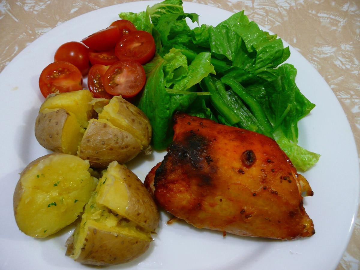 Honey and mustard chicken, baked potato with garlic butter and salad