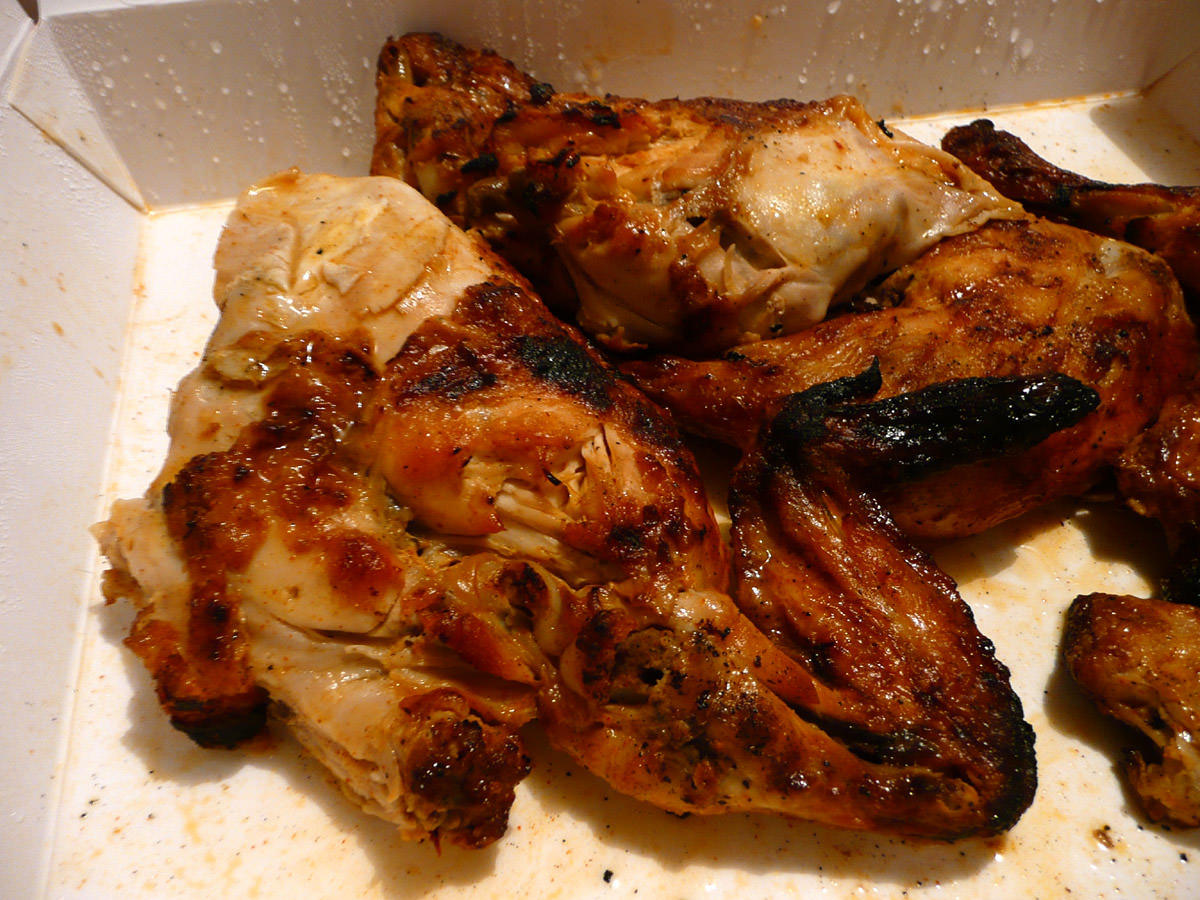Whole chicken, cut into quarters, with mild peri-peri basting- the chicken breasts