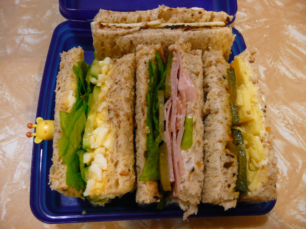 Four different dainty sandwiches