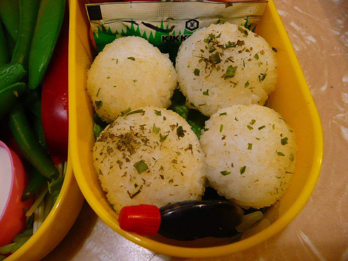Rice balls rolled in onion salt and dried chives