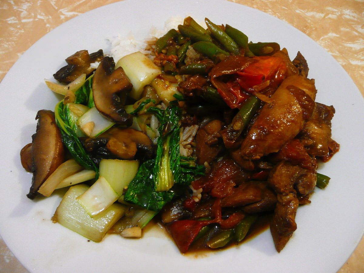 Stir-fried pak choy and mushrooms and chicken dish with no name with rice