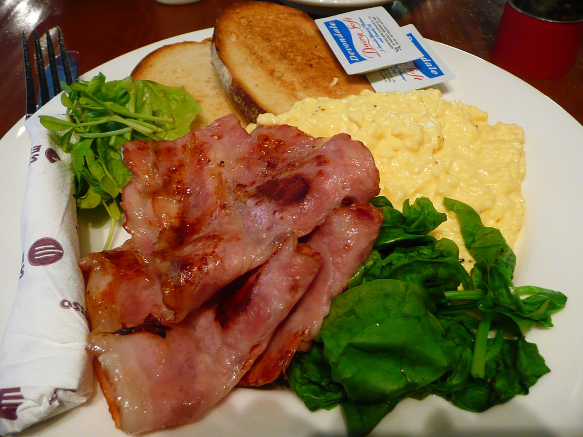 Bacon, scrambled eggs, spinach, toast