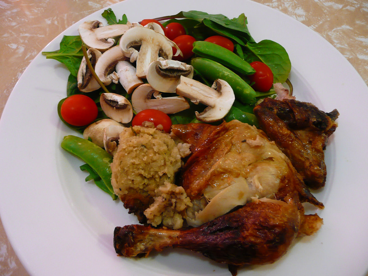 Barbecue chicken, stuffing and salad