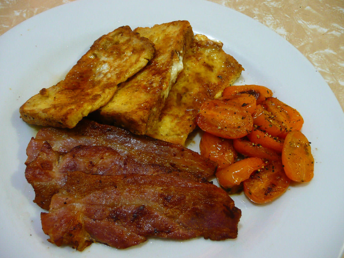 Bacon, French toast and golden tomatoes