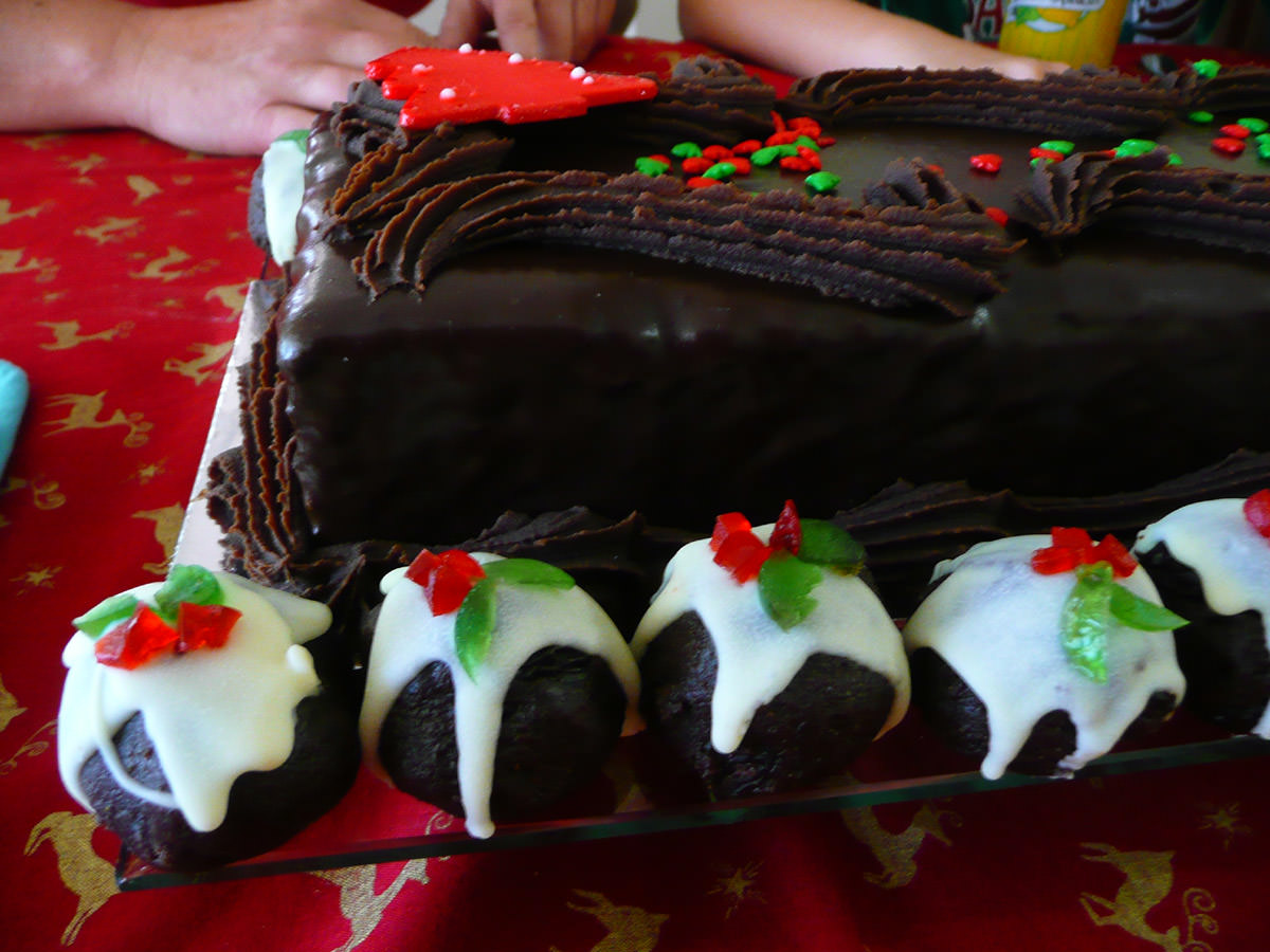 Christmas chocolate cake and mini Christmas puddings