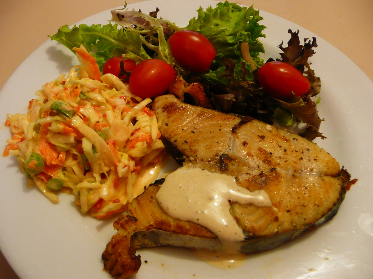 Swordfish with lemon myrtle sauce, coleslaw and salad