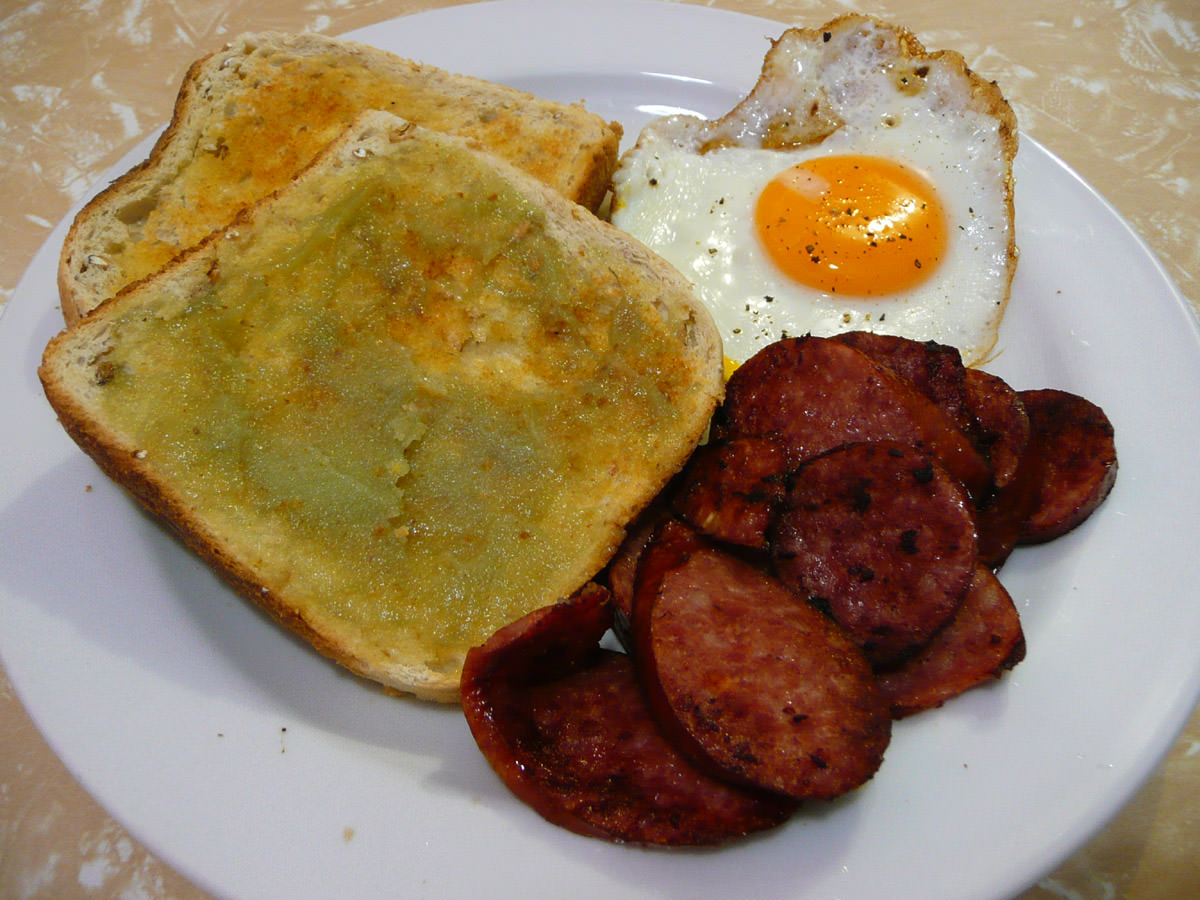 Fried bratwurst sausage, kaya on toast, fried egg