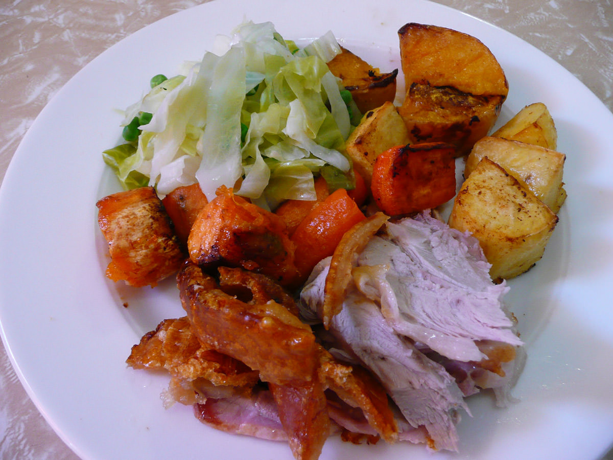 Roast pork, crackling and vegetables