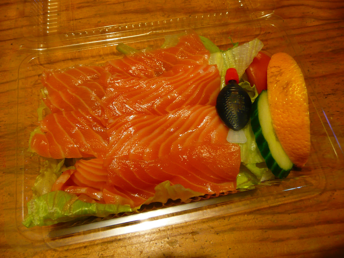 Salmon sashimi and salad