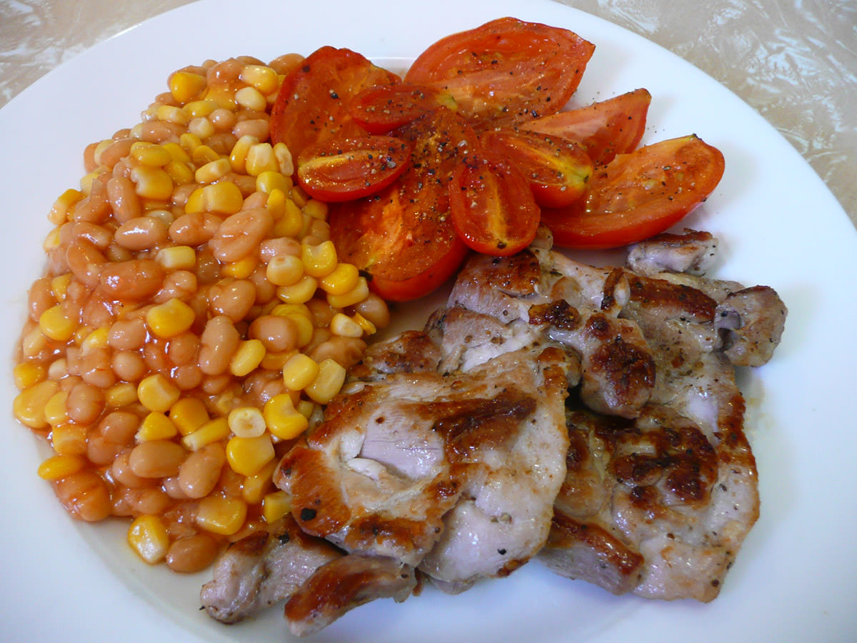 Celery salt chicken, baked beans and corn, panfried tomato