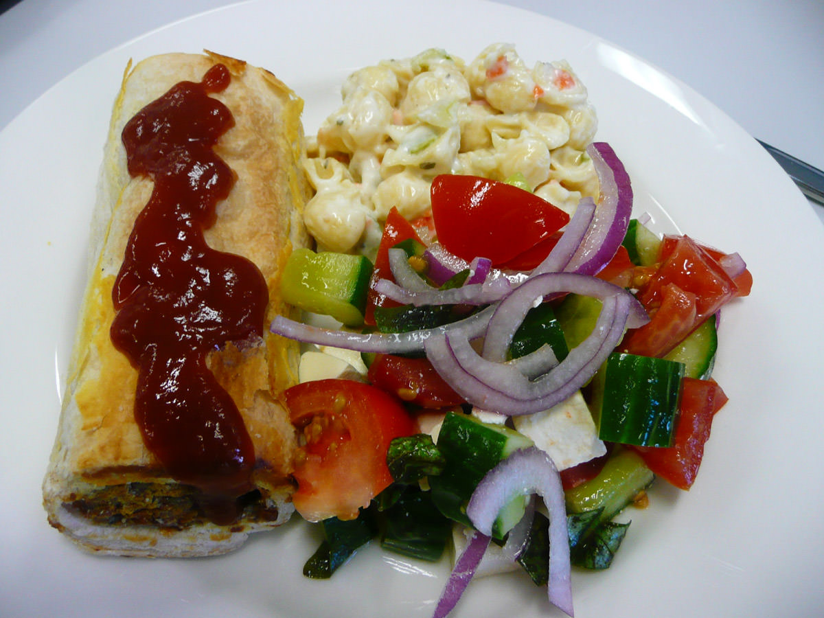 Sausage roll and sauce, greek and pasta salads
