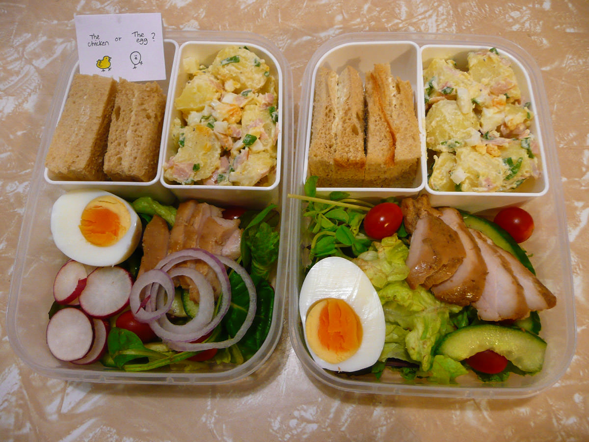 Bento lunch for two - marinated chicken, hard-boiled egg, salad and bread