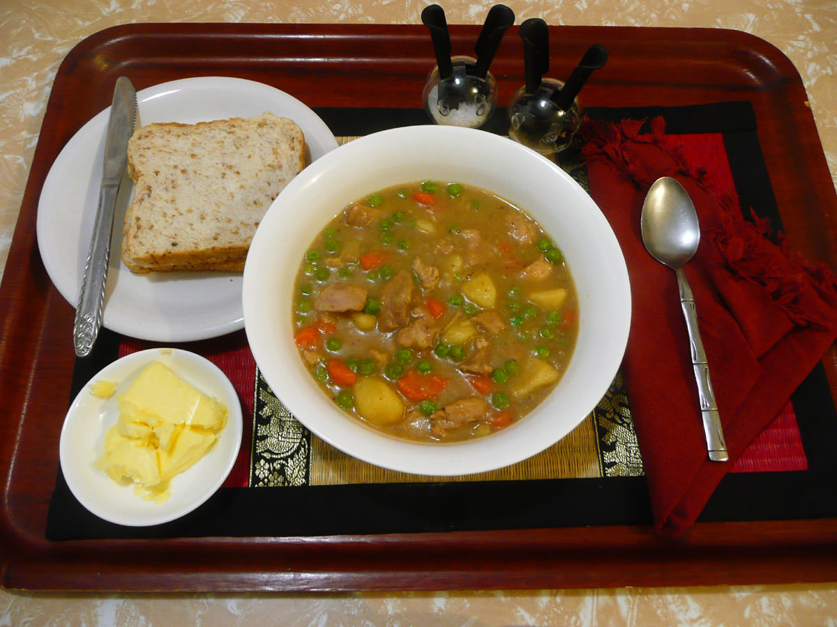 Chicken stew with bread and butter