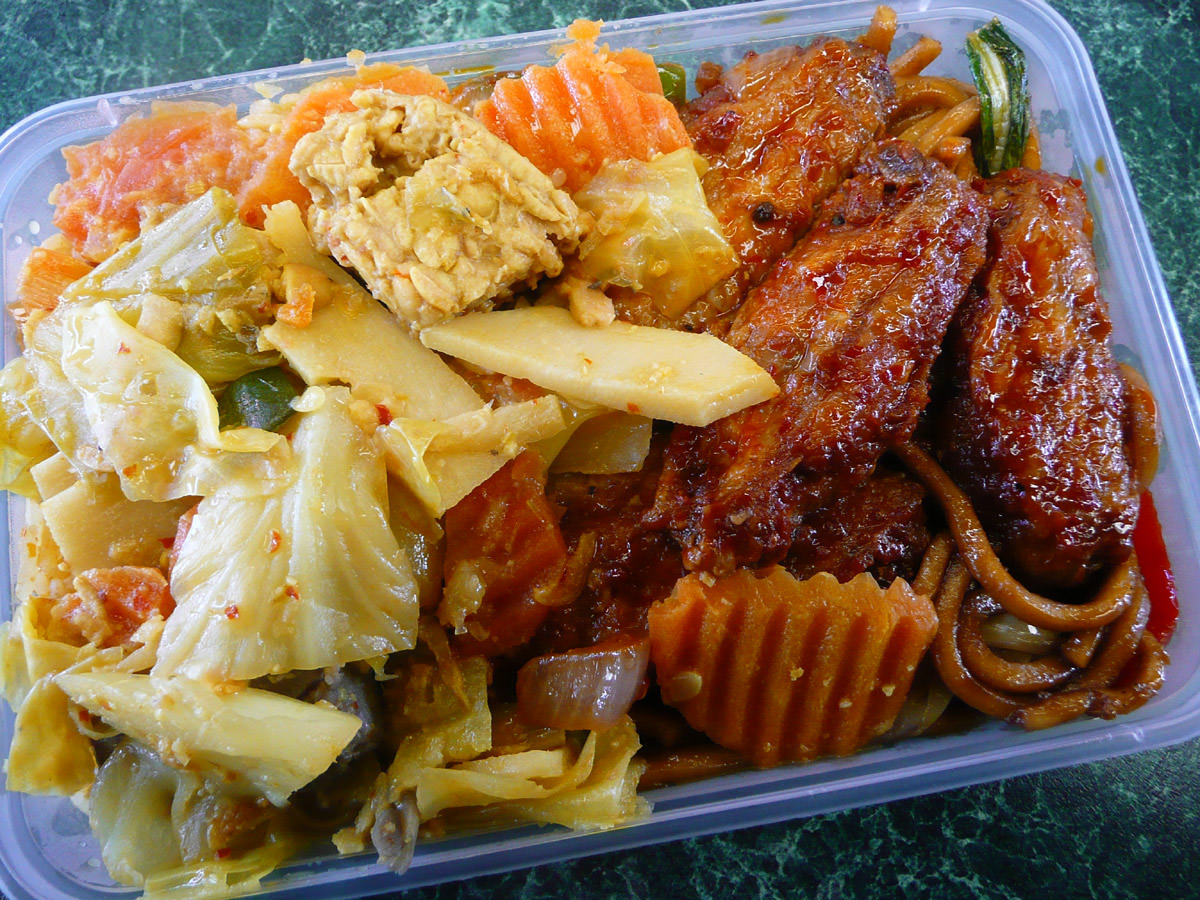 Chilli chicken, curried vegetables and noodles