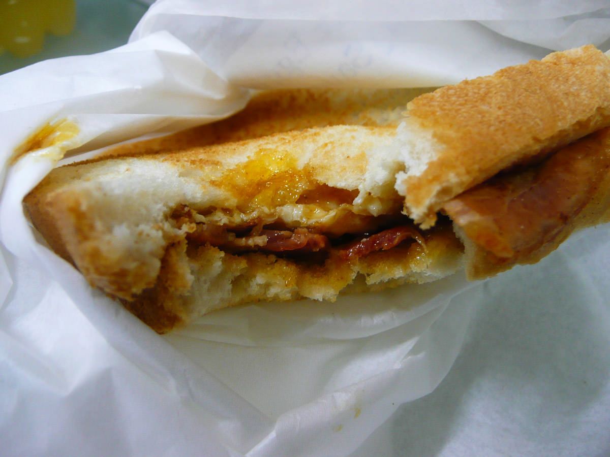 Bacon and egg sandwich with BBQ sauce innards