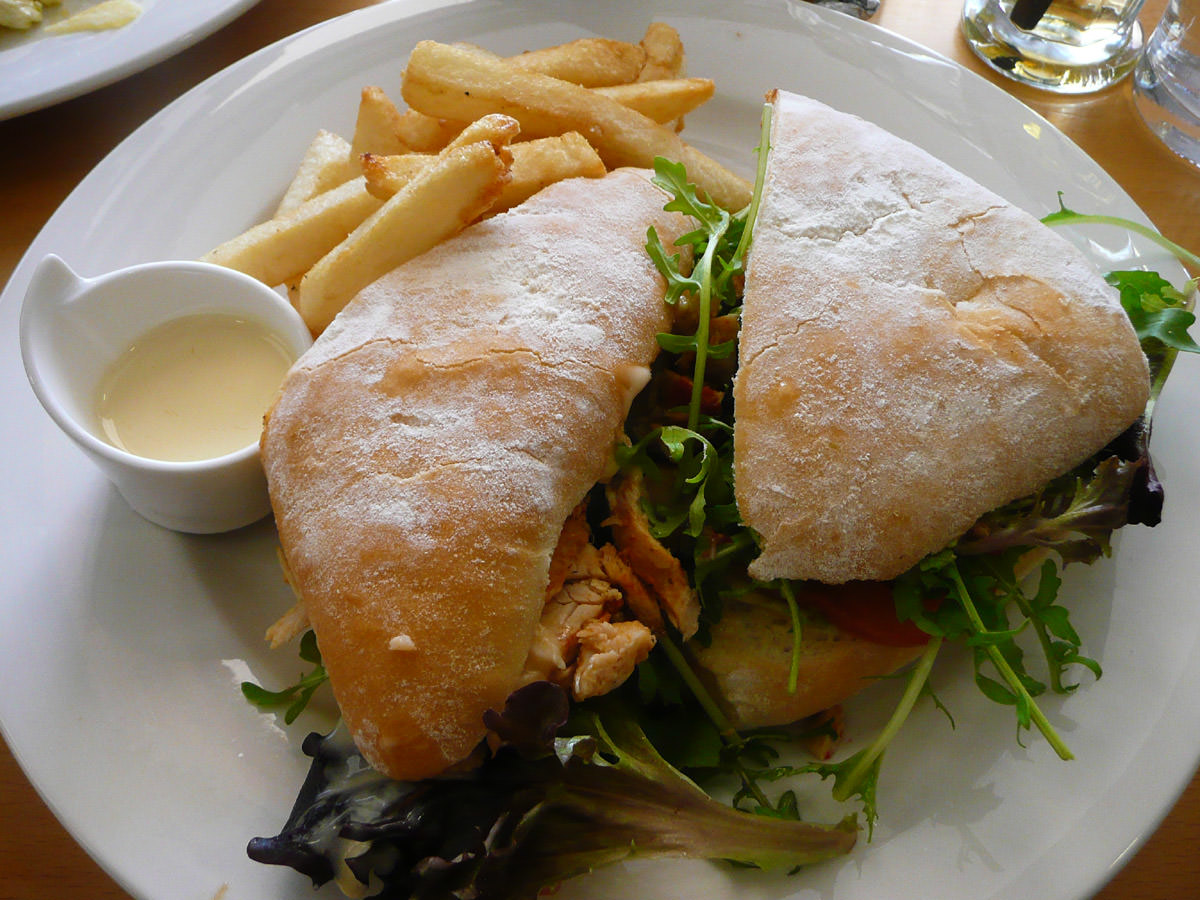 Chicken and avocado panini with chips and aioli