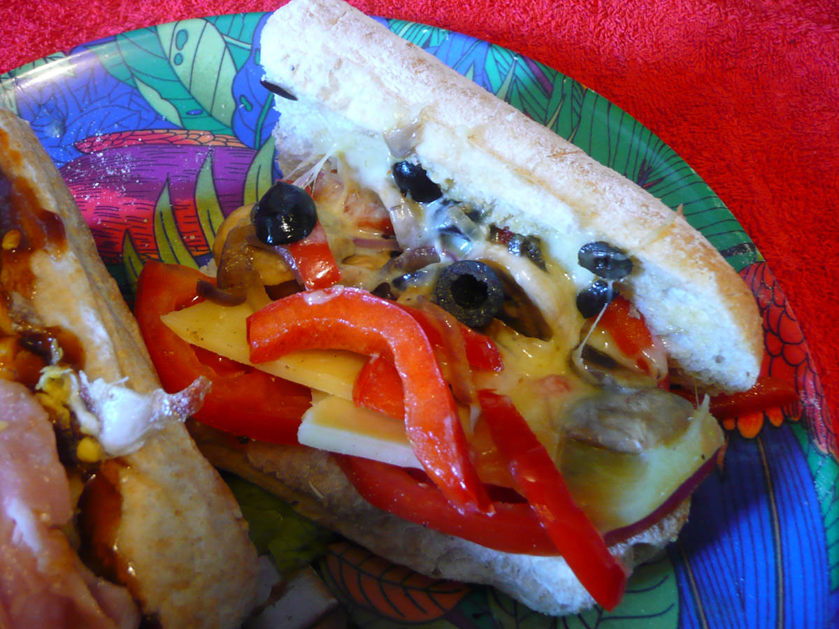 Tomato, capsicum, onions, mushrooms olives and cheese