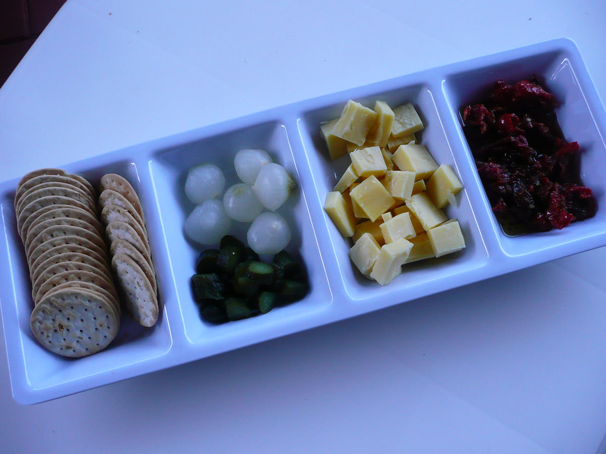 Crackers, pickles, cheese and semi-sundried tomatoes