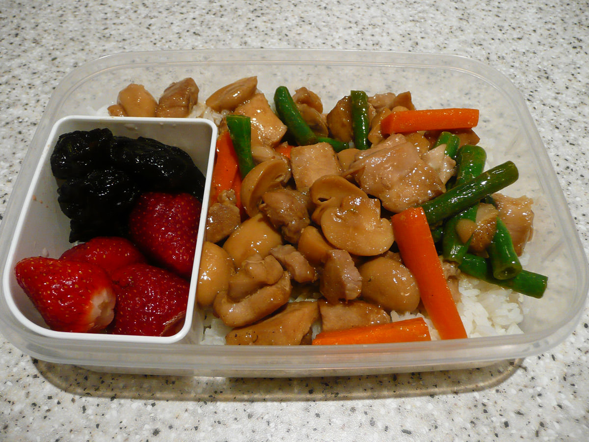 Bento - ginger chicken and vegetable stir-fry and rice, strawberries and prunes