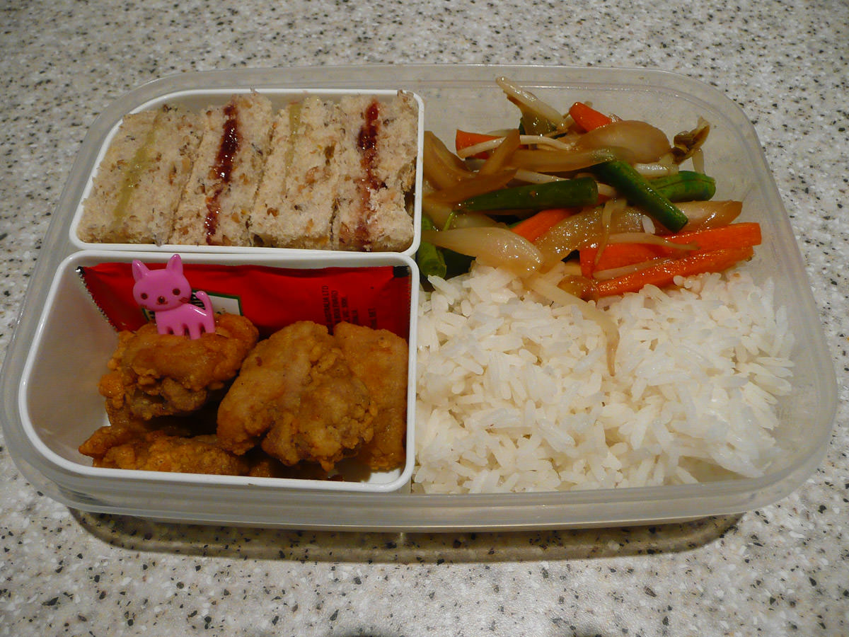 My bento lunch - fried chicken, tomato sauce, rice, ginger vegetable stir-fry and mini jam and kaya sandwiches