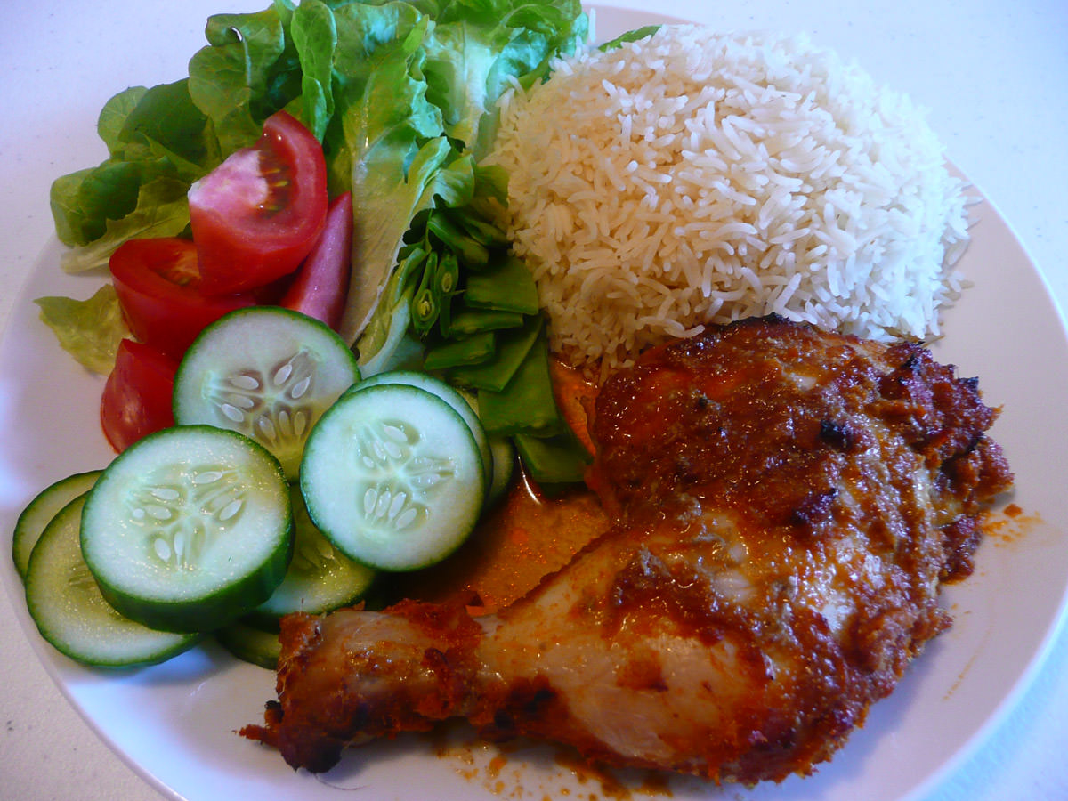 Oven-baked Thai red curry chicken, rice and salad