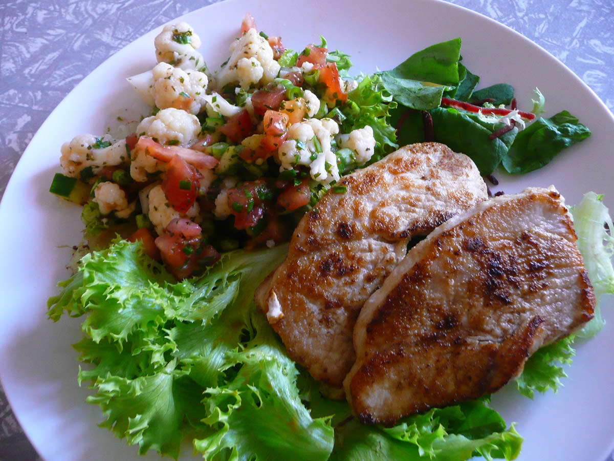 Turkey breast steaks with cauliflower salad