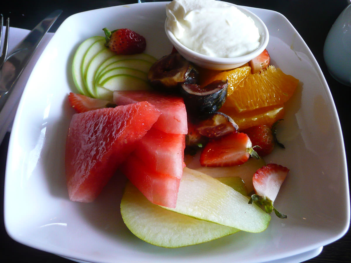 Fresh fruit plate, yoghurt and thyme honey