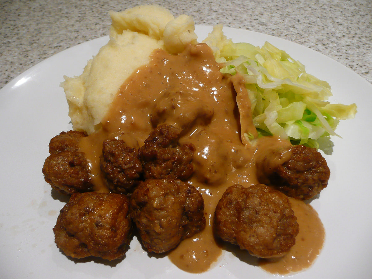 Swedish meatballs, cream gravy, mashed potatoes and steamed cabbage